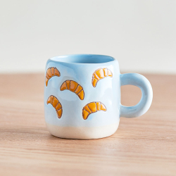 Kop med hank "Millie" - Croissant lysebl�